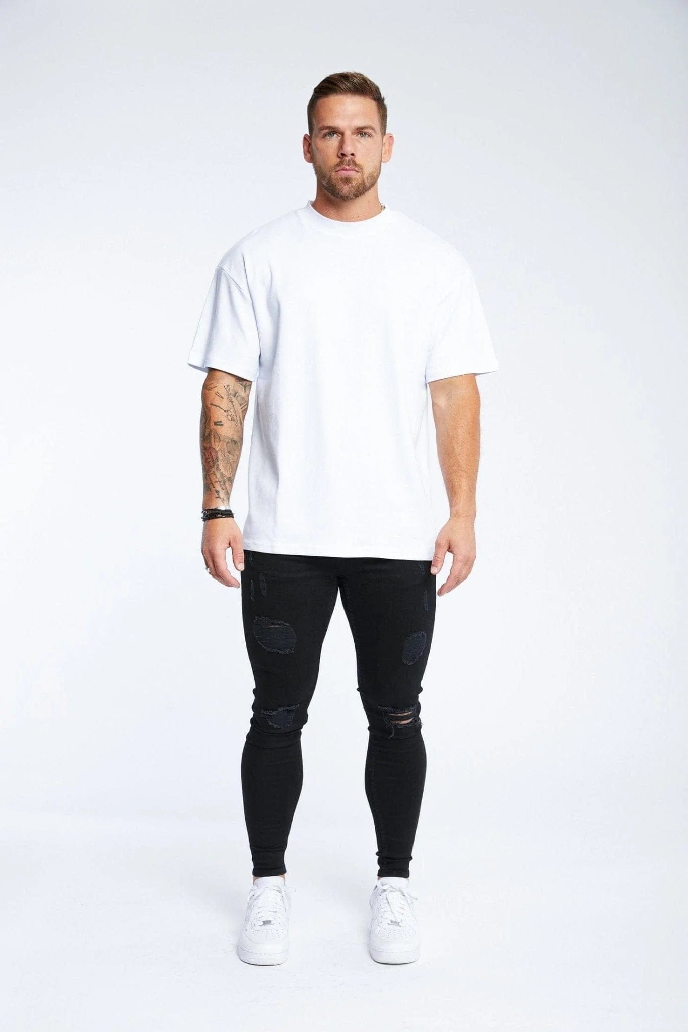 Skinny jeans store oversized t shirt