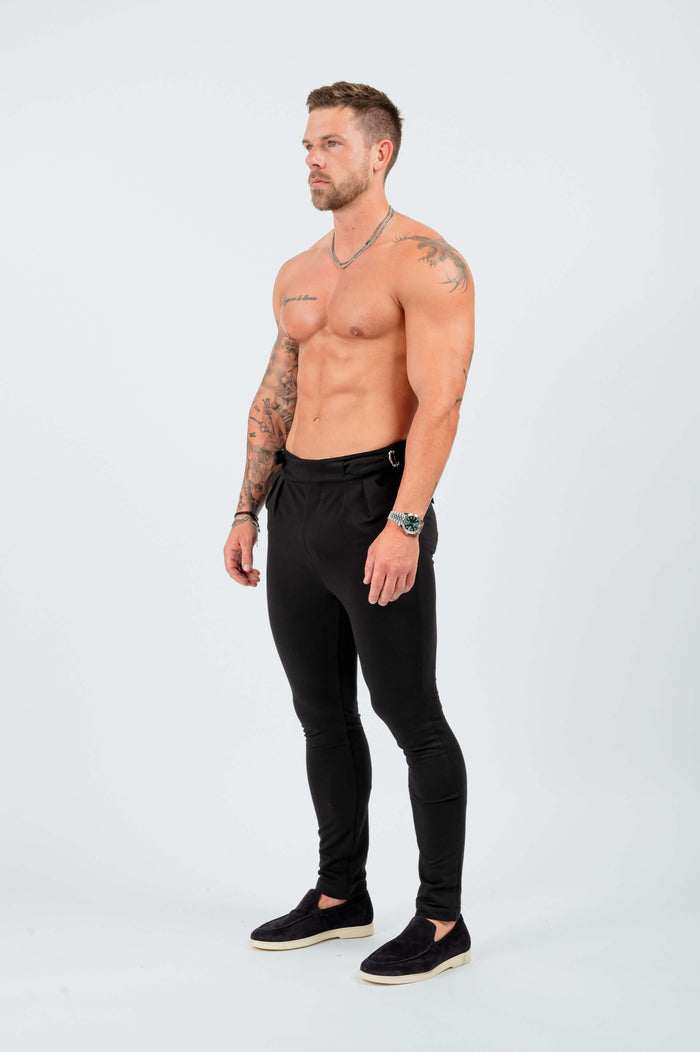 PANTALÓN SLIM FIT DE CINTURA ALTA Y CINCHE LATERAL - NEGRO