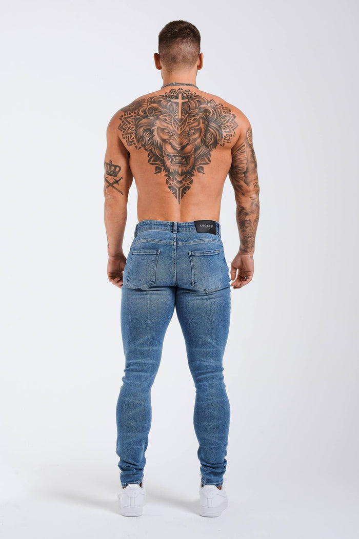 SLIM JEANS 2.0 ESSENTIËLE GESCHEURD - BLAUWE WASH