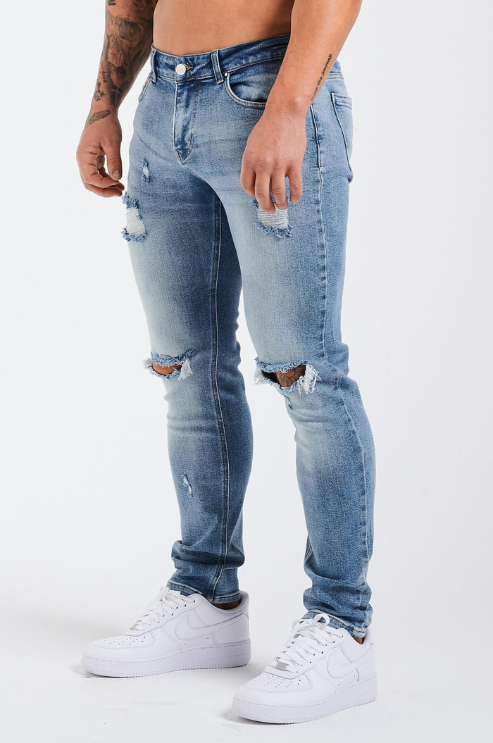 SLIM JEANS 2.0 GESCHEURD EN GEREPAREERD - MIDDENBLAUW