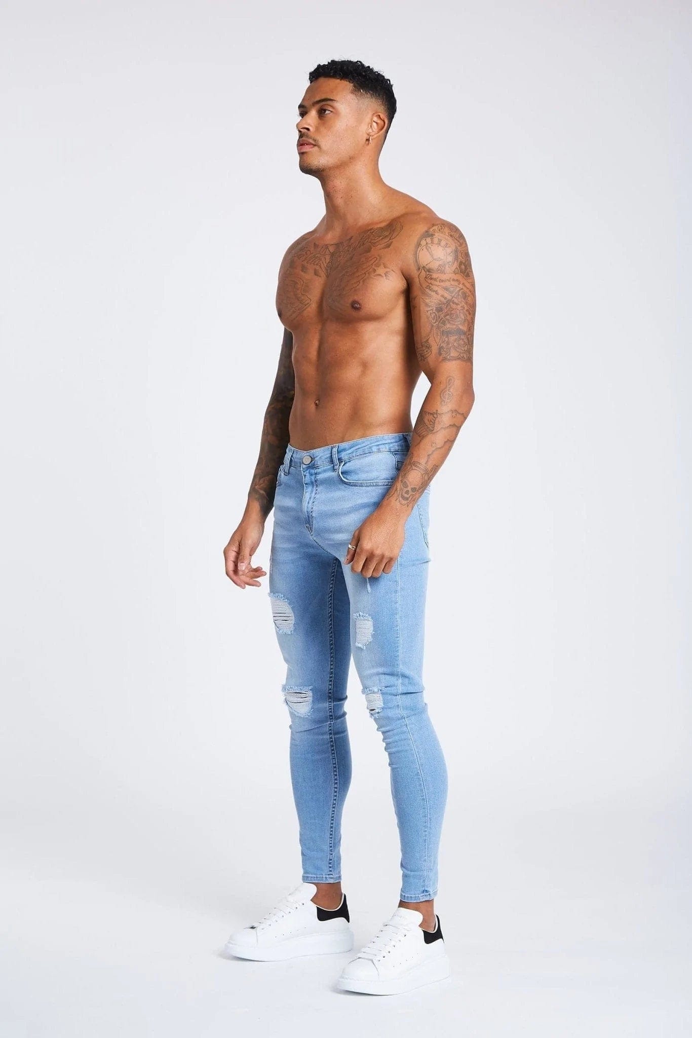 LIGHT BLUE JEANS RIPPED AND REPAIRED, 49% OFF