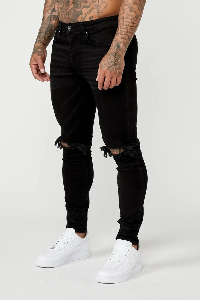 JEANS PREMIUM SKINNY FIT-RODILLA NEGRA DESTRUIDA