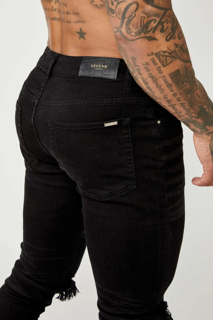 JEANS PREMIUM SKINNY FIT-RODILLA NEGRA DESTRUIDA