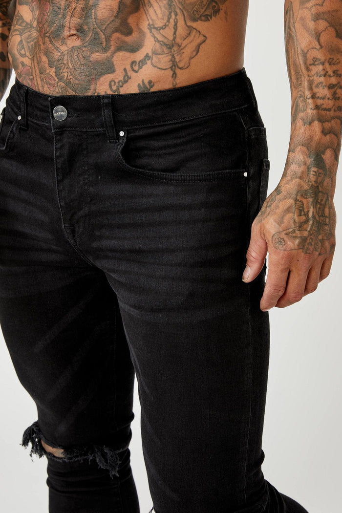 JEANS PREMIUM SKINNY FIT-RODILLA NEGRA DESTRUIDA