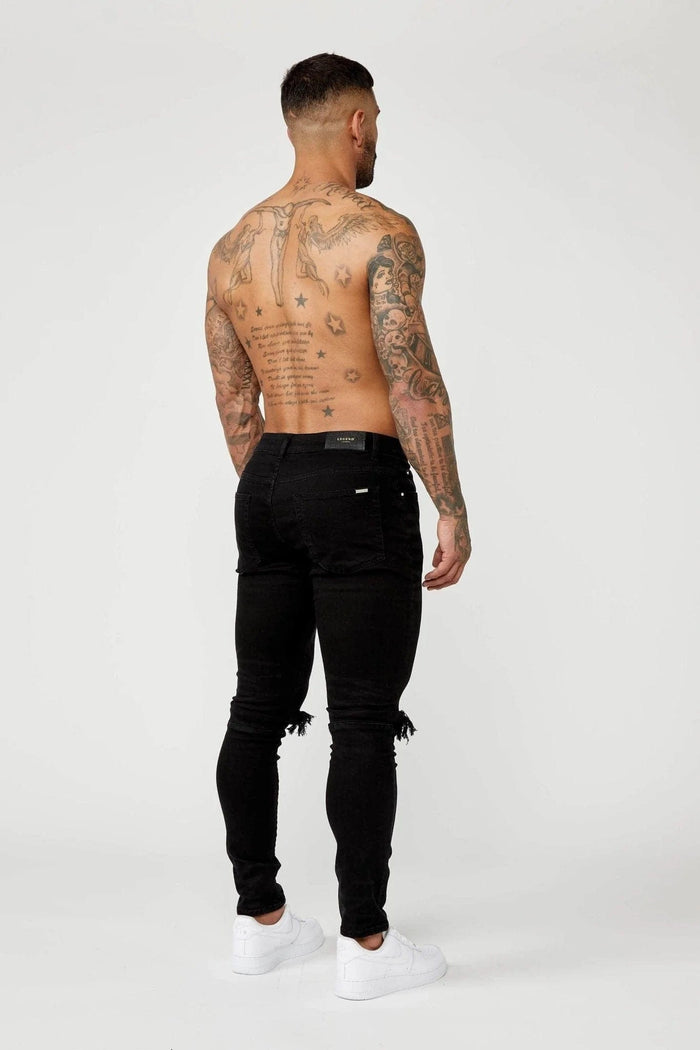 JEANS PREMIUM SKINNY FIT-RODILLA NEGRA DESTRUIDA