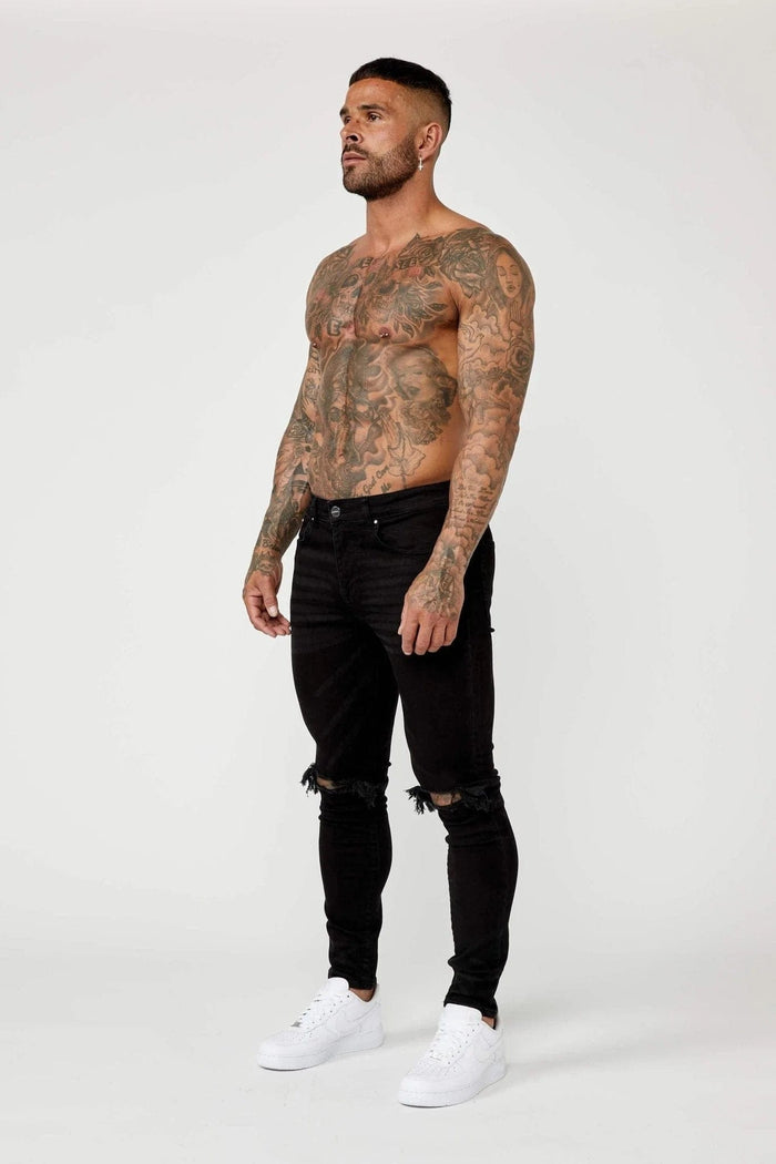 JEANS PREMIUM SKINNY FIT-RODILLA NEGRA DESTRUIDA