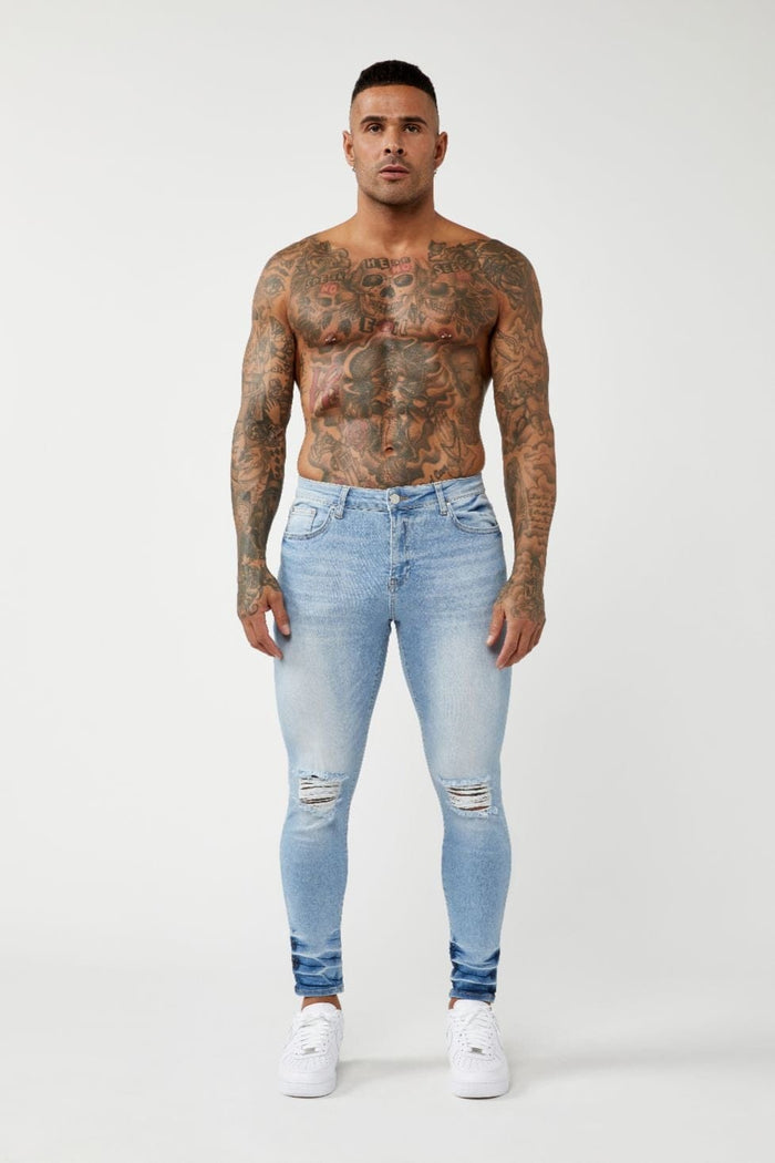 PREMIUM SKINNY FIT JEANS - LIGHT BLUE RIPPED KNEE