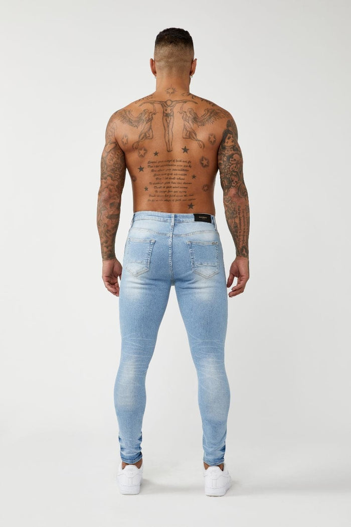 PREMIUM SKINNY FIT JEANS - LIGHT BLUE RIPPED KNEE