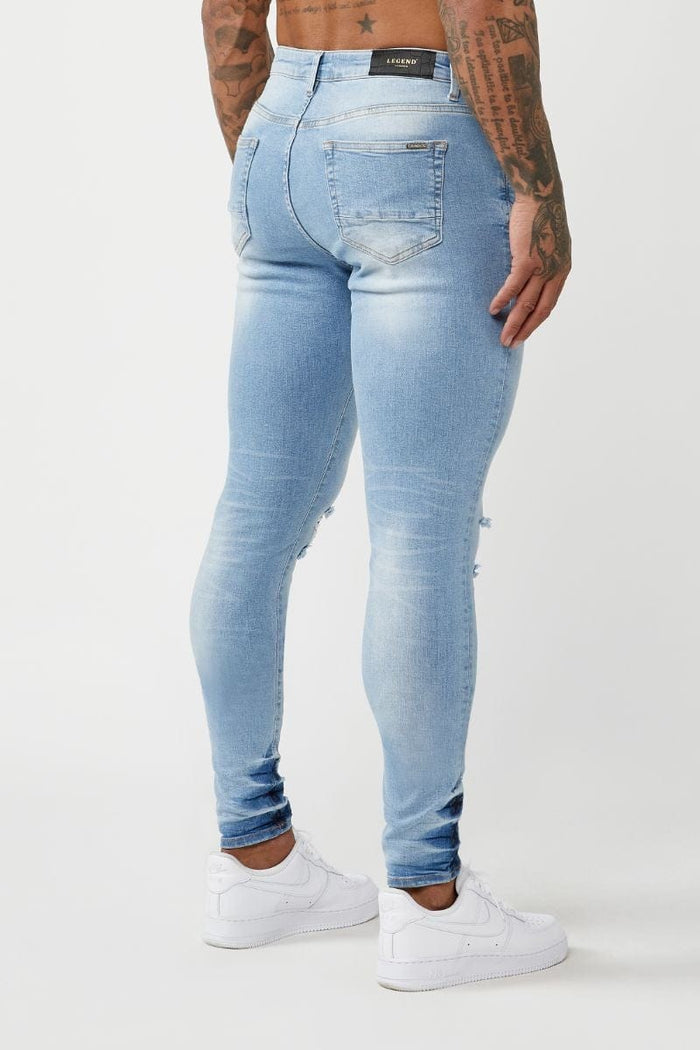 PREMIUM SKINNY FIT JEANS - LIGHT BLUE RIPPED KNEE