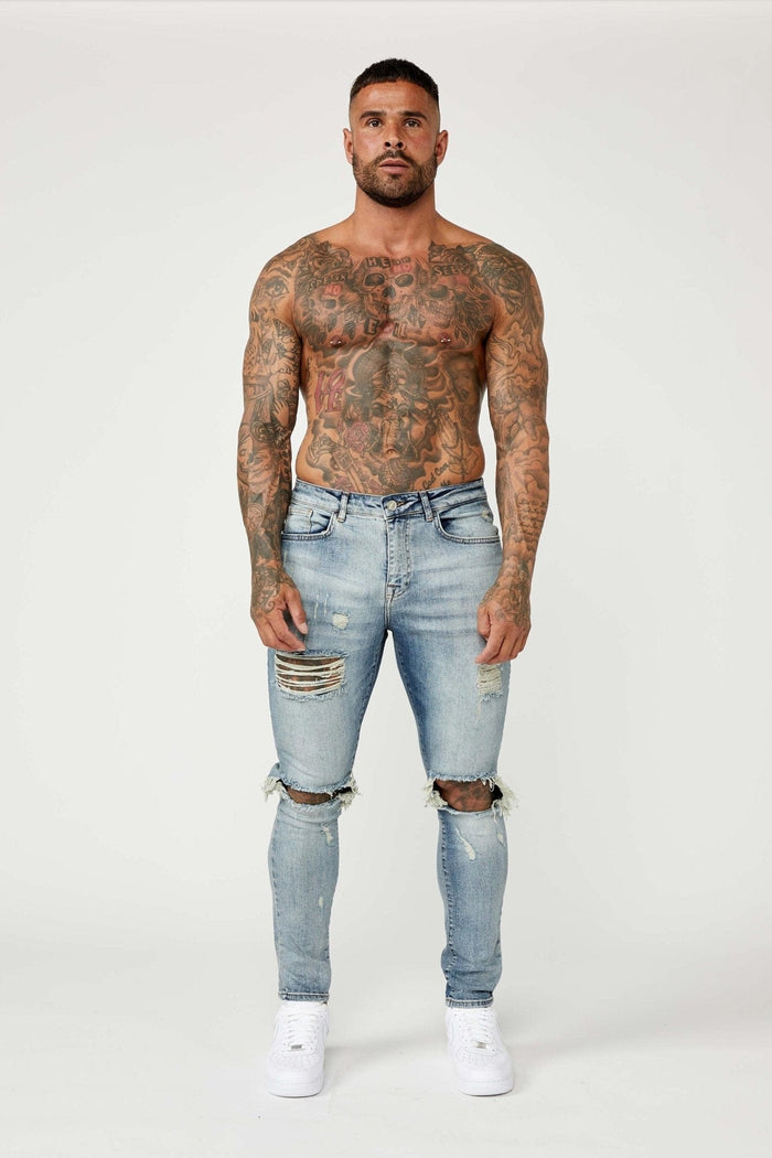 SKINNY FIT JEANS - MIDDENBLAUW GESCHEURD & GEREPAREERD