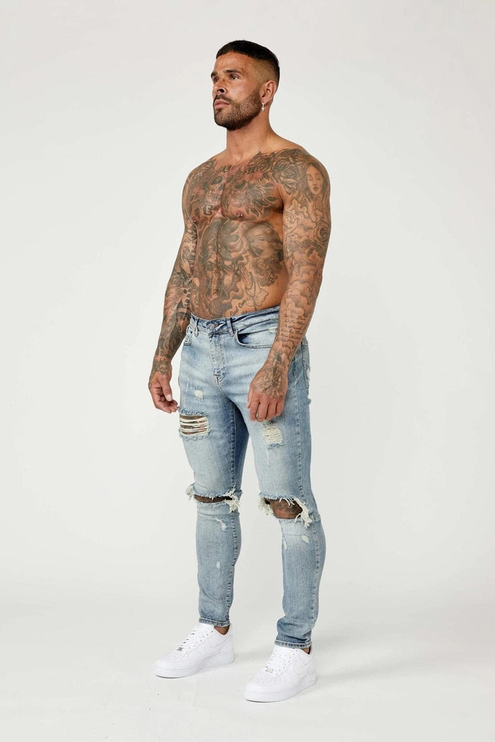 SKINNY FIT JEANS - MIDDENBLAUW GESCHEURD & GEREPAREERD