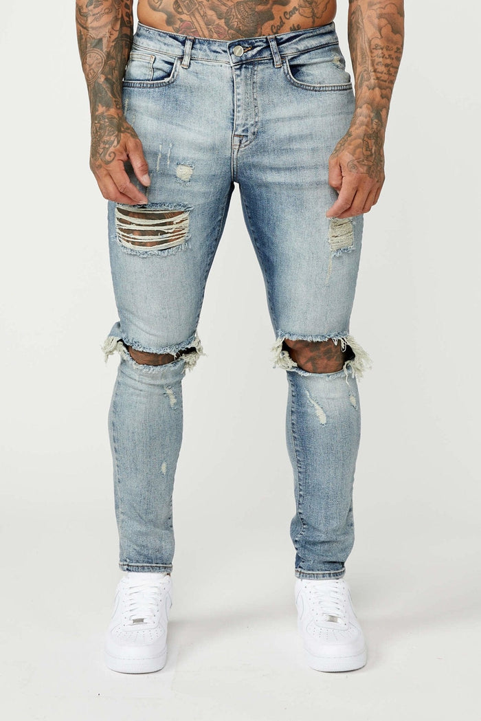 SKINNY FIT JEANS - MIDDENBLAUW GESCHEURD & GEREPAREERD