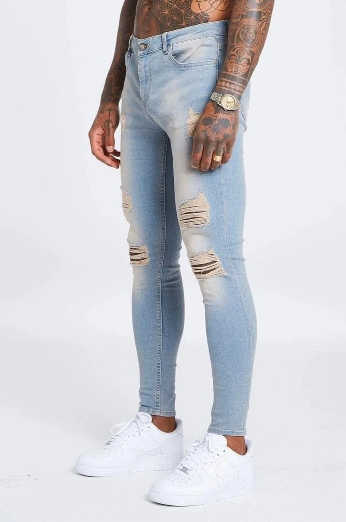 Stone Washed Jeans - Gescheurd en gerepareerd