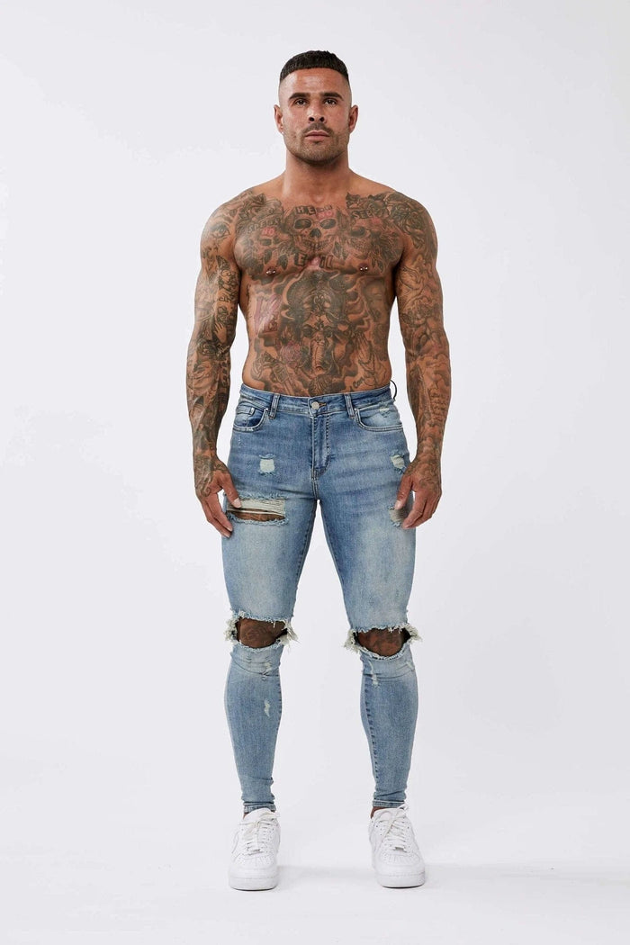 SKINNY FIT JEANS RIPPED & REPAIRED - STRONG WASHED MID BLUE