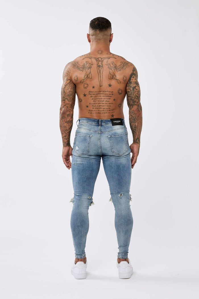 SKINNY FIT JEANS RIPPED & REPAIRED - STRONG WASHED MID BLUE