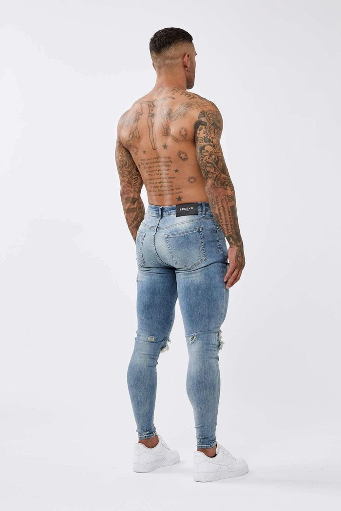 SKINNY FIT JEANS RIPPED & REPAIRED - STRONG WASHED MID BLUE