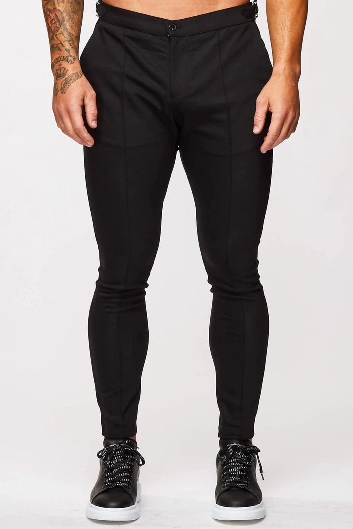 Pantalones elásticos de estampado plano con tirantes laterales - negro