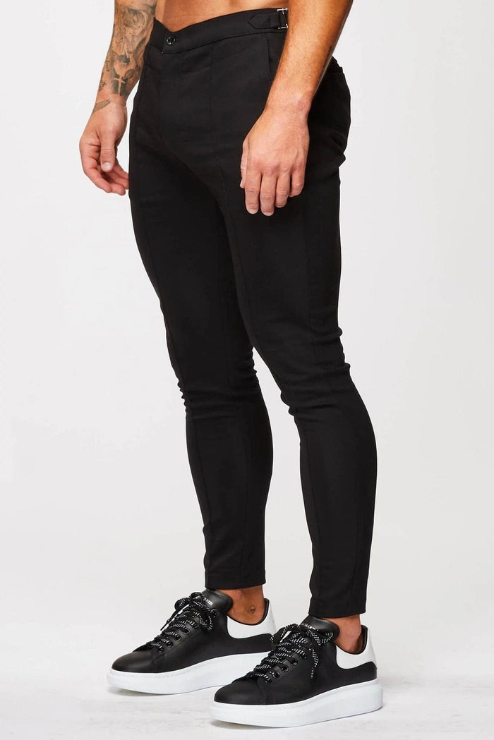 Pantalones elásticos de estampado plano con tirantes laterales - negro