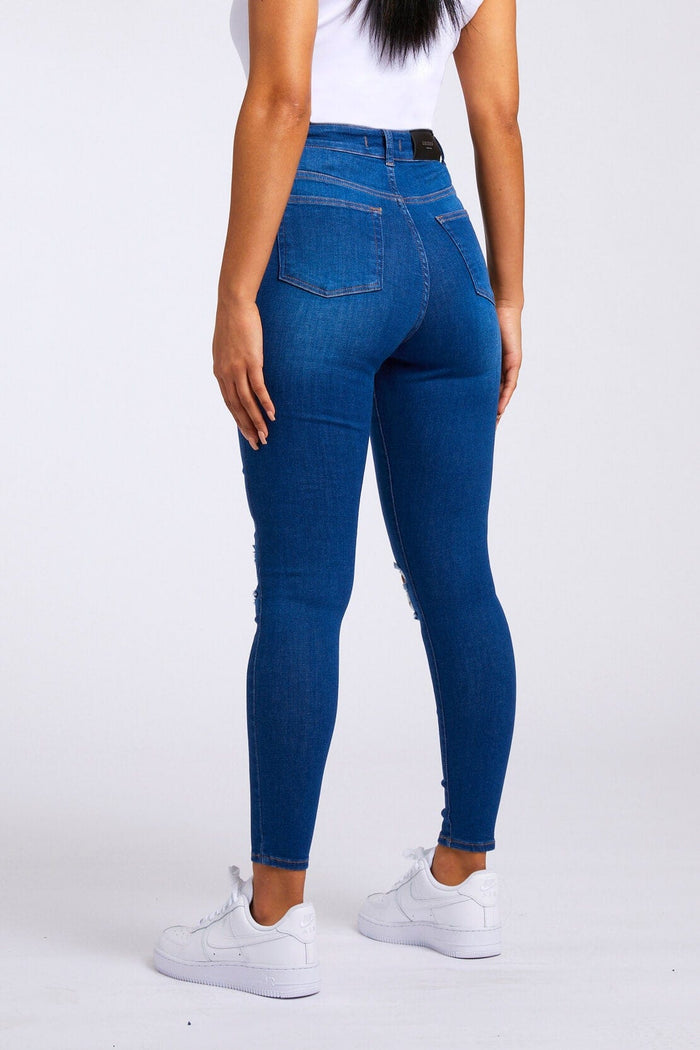 SKINNY JEANS GESCHEURD EN GEREPAREERD - DONKERBLAUW