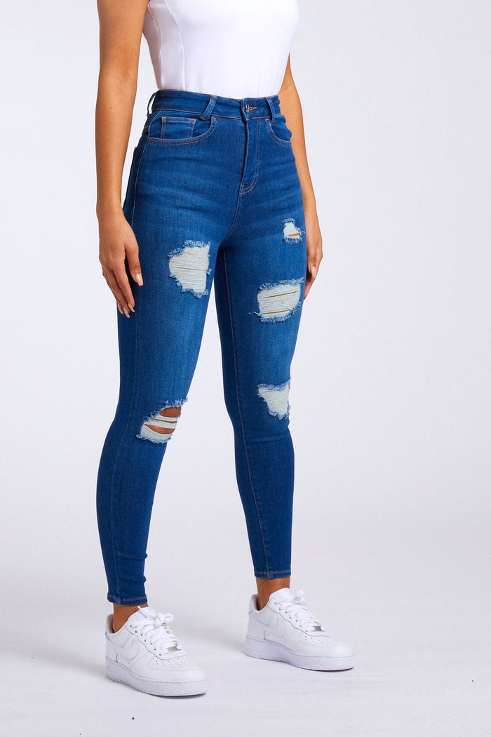 SKINNY JEANS GESCHEURD EN GEREPAREERD - DONKERBLAUW