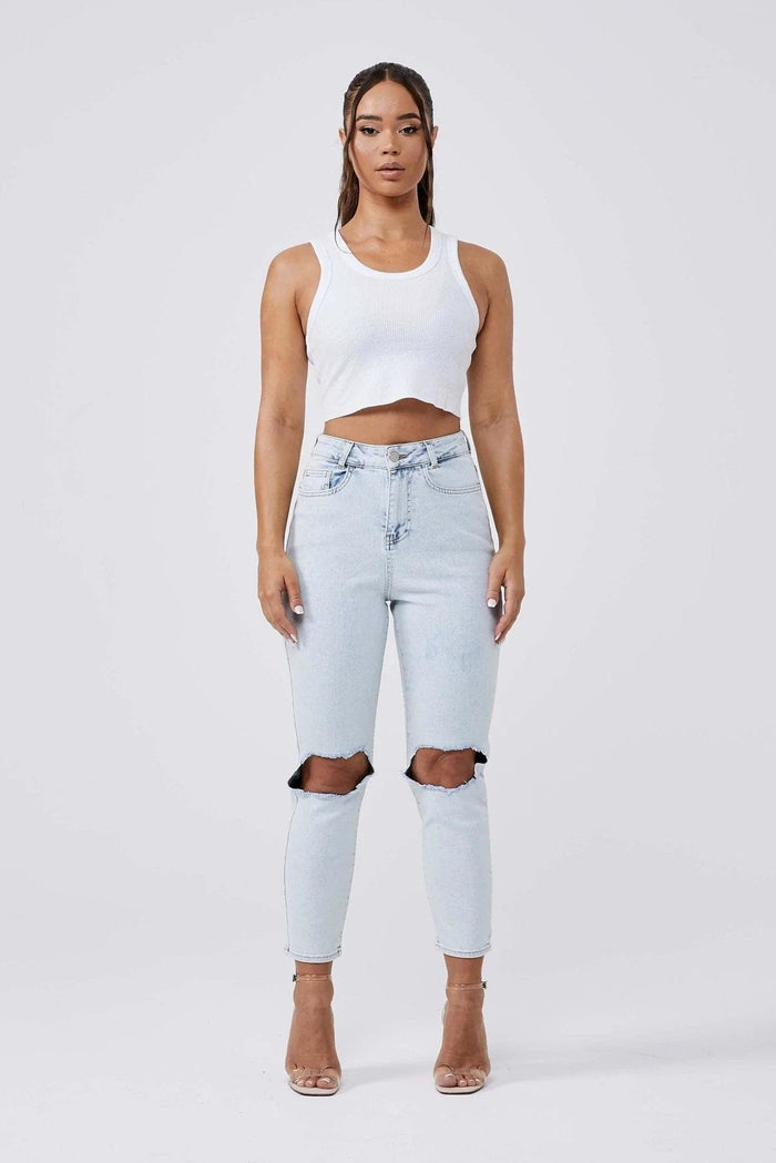 MOM-JEANS MIT KNIEZERRISSEN – BLEACH-WASCHUNG